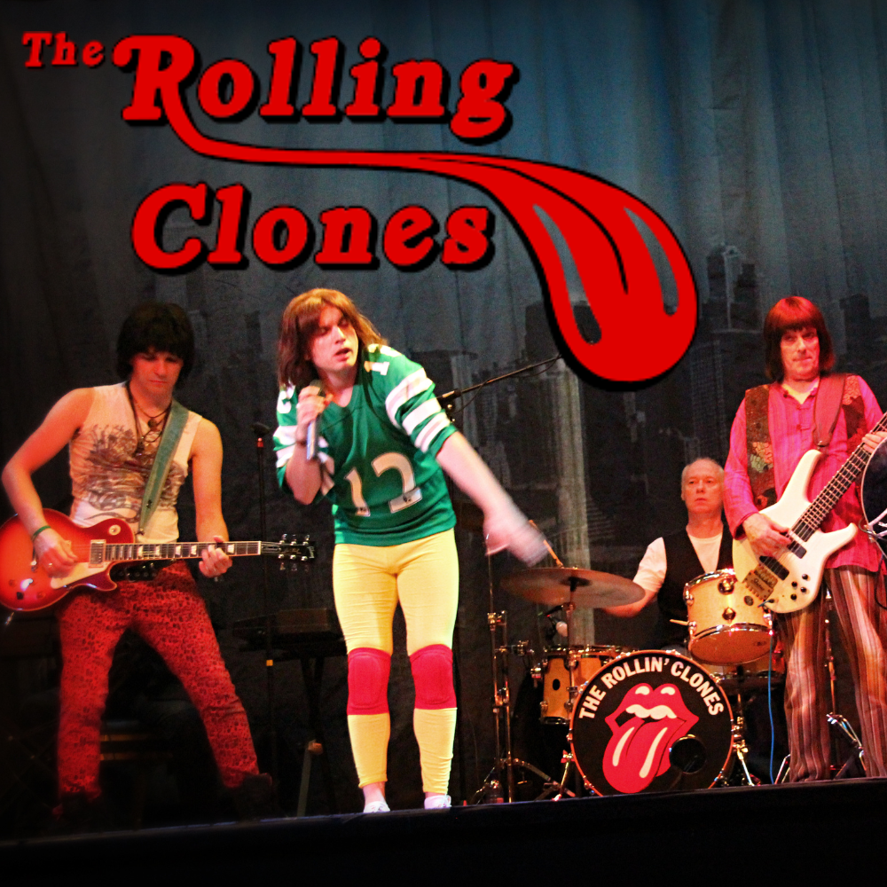 The Rolling Clones. Rock band on a stage, "The Rollin' Clones" on the drums in the style of famed Rolling Stones red lips and tongue motif.