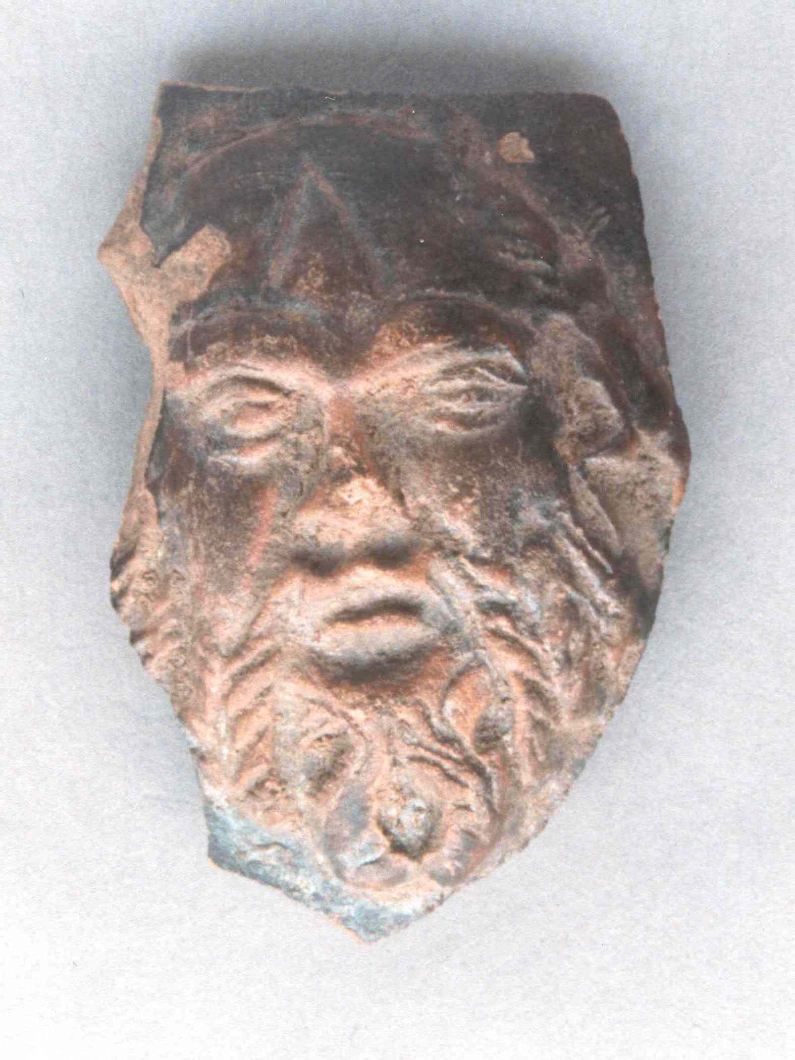 Roman pottery mask Roman pottery mask